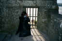 04-24-01 Mont st Michel Jen taking photo.jpg (82725 bytes)